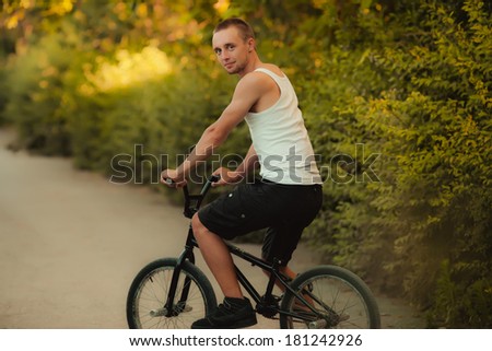 Young man on bike
