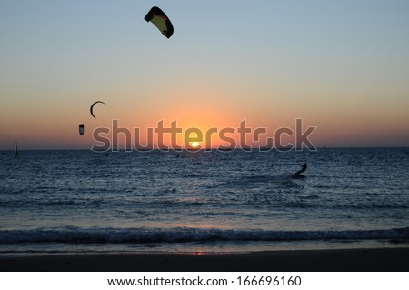 TEL AVIV - OCTOBER 26: Kitesurfer is kite boarding on October 26, 2013 in Tel Aviv, Israel.In 2013, the number of kitesurfers estimated to 1.5 million persons world wide.