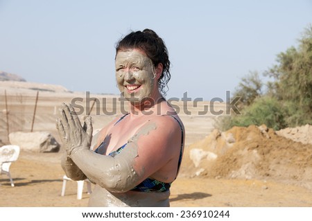 Woman with mud at dead sea,Israel