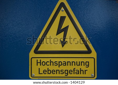 High Voltage Sign with blue background in german