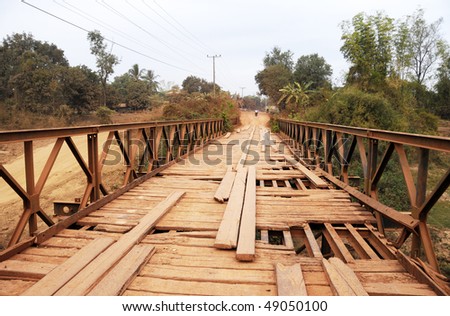 Broken bridge in a secondary road Laos