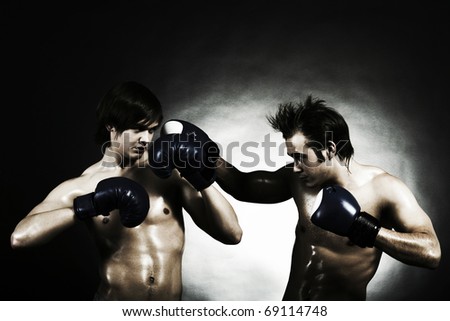 Two boxers during the boxing match