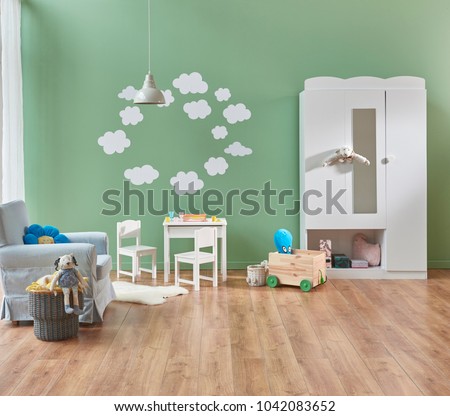 baby room modern and new style. Green wall and background decoration white detail and sofa. Modern cupboard decoration.