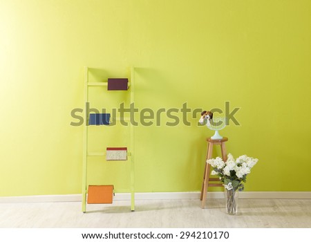 green wall room decor and stairs