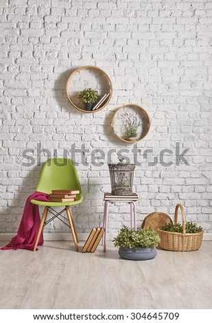 basket and brick wall decor with round frame