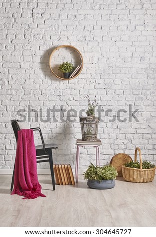 black chair and brick wall decor with wooden floor and purple warp