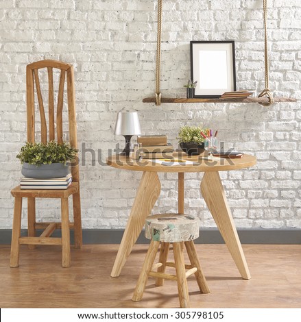 work table brick wall decoration and wooden chair