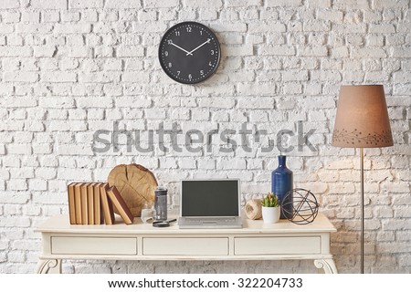 brick wall  banner, laptop, black clock, winter style