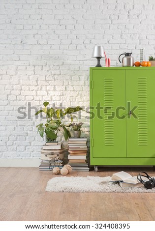 cozy study room of the young student interior concept with green cabinets