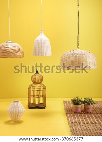 yellow wall interior decoration wicker lighting and wicker rug with yellow floor concept