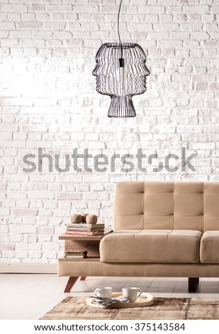 modern sofa living room with stone wall and modern lamp