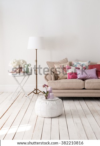classic sofa and decorative lamps behind white wall interior decor