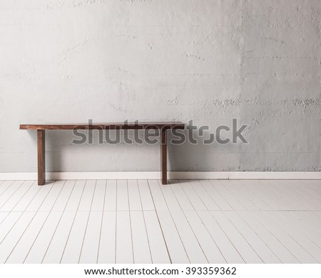 grey concrete wall wooden modern desk with wooden floor