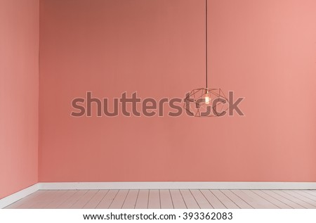 light pink color wall with modern lamp and empty concept