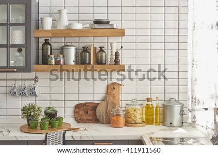 white tiles wall modern kitchen with chopping board