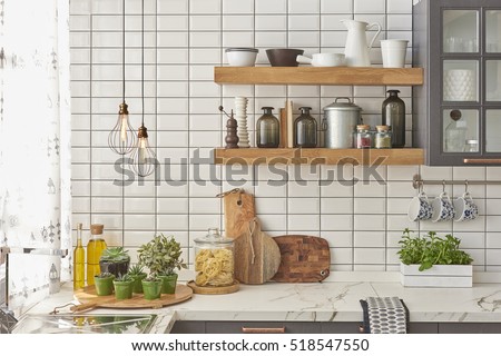 white tiles wall modern kitchen with chopping board, modern lamp