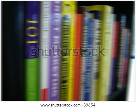 bookcase full of business reference material