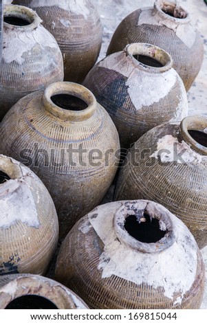 Many old clay Jar in the factory, Thailand