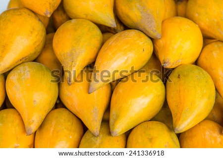 Egg fruit or Canistel on sale stand, Thailand.