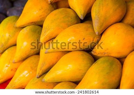 Egg fruit or Canistel on sale stand, Thailand.