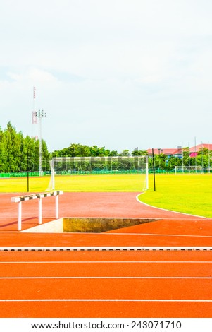 Running track, hurdle and goal in Thailand.