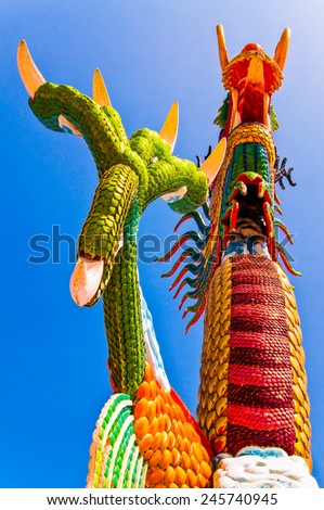 The flat of the dragon foot statue with blue sky, Thailand.