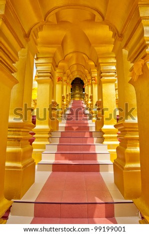 Golden frame of walk way at Wat Pasawangboon temple, Thailand.
