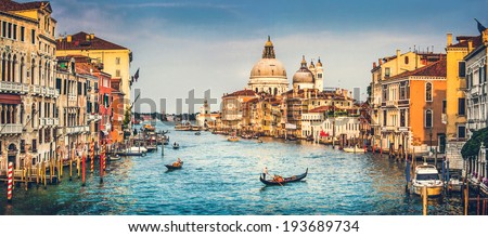Panoramic view of famous Canal Grande and Basilica di Santa Maria della Salute at sunset in Venice Italy with retro vintage Instagram style filter effect Panoramic view of famous Canal Grande and Basilica di Santa Maria della Salute at sunset in Venice Italy with retro vintage Instagram style filter effect