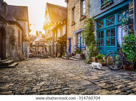 Panoramic view of old town in Europe in beautiful evening light at sunset with retro vintage Instagram style filter and lens flare effect
