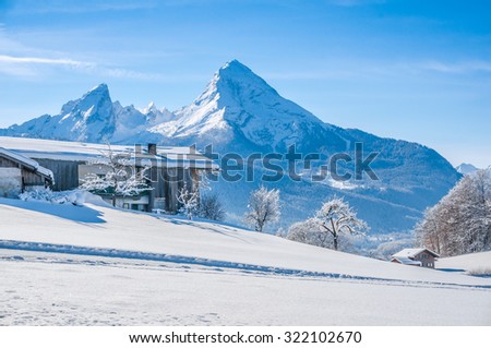 Beautiful mountain landscape in the Bavarian Alps with traditional farm house and  famous Watzmann in the background, Nationalpark Berchtesgadener Land, Bavaria, Germany