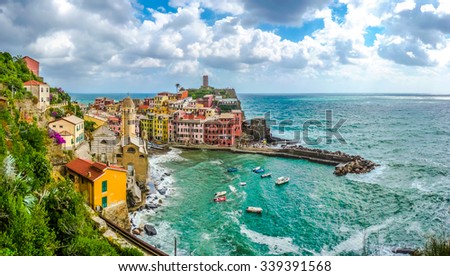 Beautiful view of Vernazza, one of the five famous fisherman villages of Cinque Terre with dramatic cloudscape in Liguria, Italy