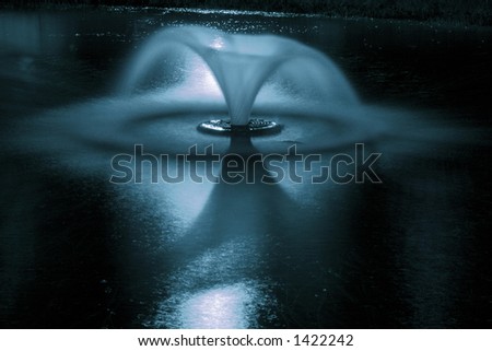 A small fountain at night