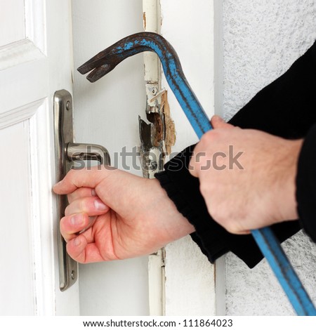 Thief breaking door