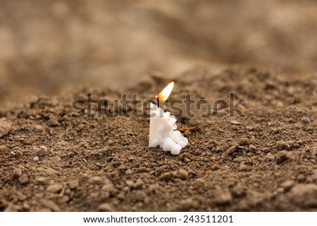 Candle on earth funeral