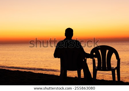 Man on chair alone