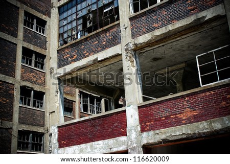 DETROIT, MICHIGAN - NOV 21: Abandoned Packard factory ruins on a sunny afternoon on November 21, 2012. Abandoned in 1958, the buildings still stand in a decayed state of beauty.