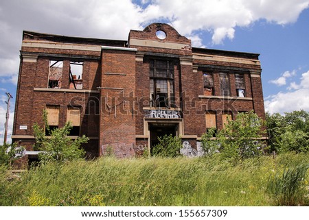 DETROIT, MICHIGAN - NOV 21: Abandoned building ruins on a sunny afternoon on November 21, 2012.