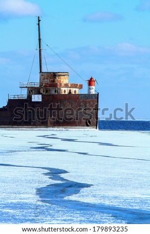 Old Ship Frozen Lake Ontario. An old, abandoned ship on Lake Ontario during the record breaking winter of 2013-2014.