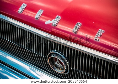 MISSISSAUGA, CANADA - JULY 6 2014: Dodge nameplate on the front of a classic Dodge Coronet muscle car. As seen at \