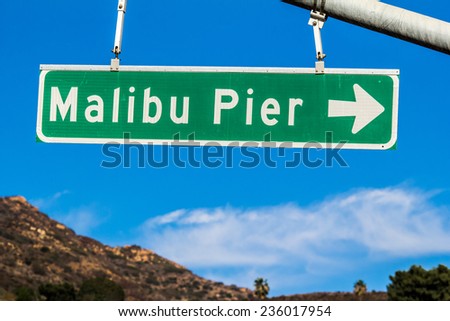 Malibu Pier Street Sign. A street sign on the Pacific Coast Highway indicating Malibu Pier in Malibu, California.