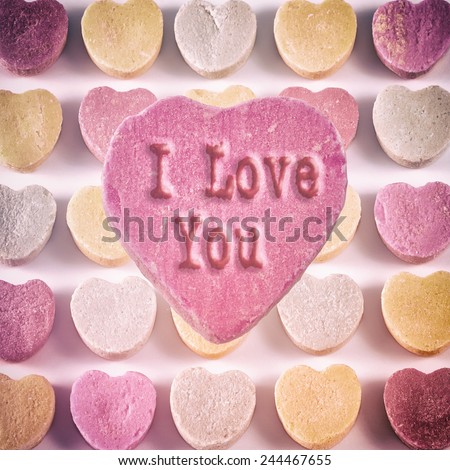 Candy Hearts I Love You. A pink candy heart with the words \