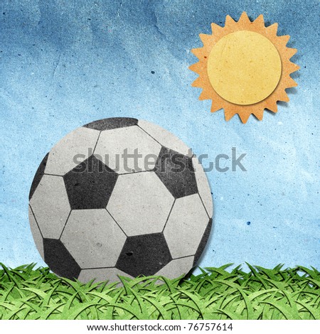 football on field recycled paper craft stick on paper background