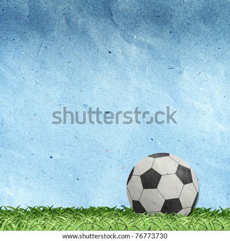 football on field recycled paper craft stick on paper background