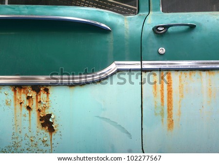 Close up of old rusty car door with space for your text