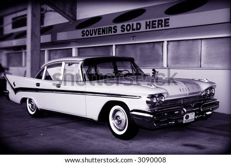 Classic 50\'s era car at drive-in theater souvenir stand