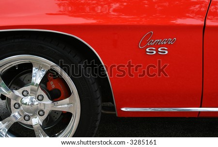 stock photo Side of 68 Candy Apple Red Camaro SS