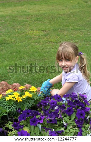 Plantinggarden on Lovable Young Girl Planting Flowers In A Garden Stock Photo 12244777