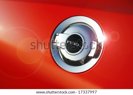 Fuel door icon on side of a custom muscle car