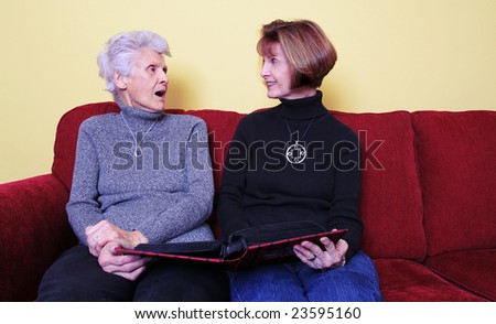 Woman telling her older mother a shocking revelation