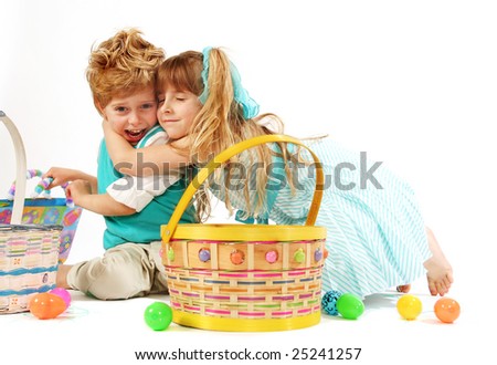 cartoon girl and boy hugging. stock photo : Adorable little girl and oy hugging. Easter Theme